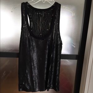 Sequined tank top.  Versatile dressed up or down